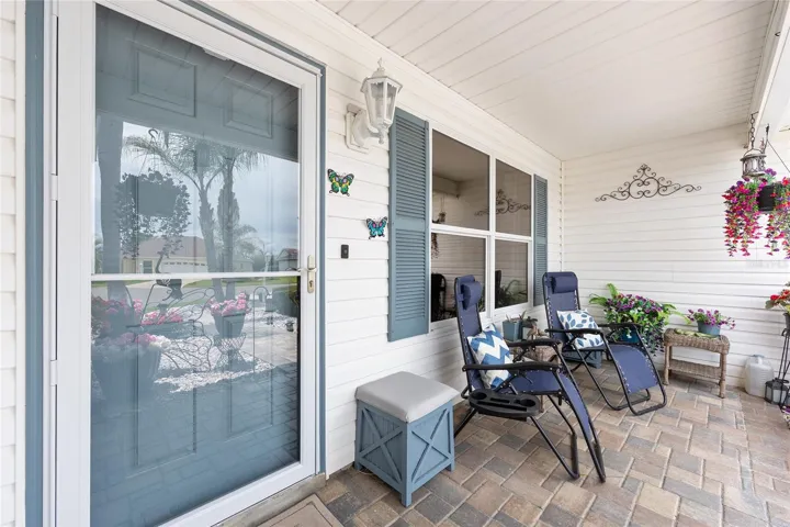 Glass Storm door & Paver Front Porch