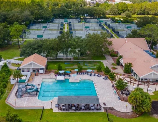 Hunter's Green Country Club, offering access to an 18-hole Tom Fazio-designed golf course, premier tennis facilities, a state-of-the-art fitness center, and resort-style pool.