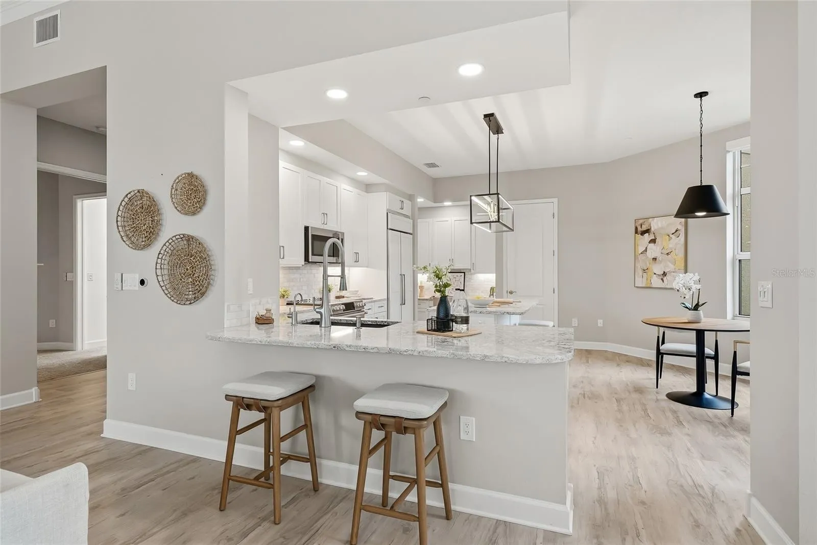 Oversized peninsula with Cambria quartz countertops.