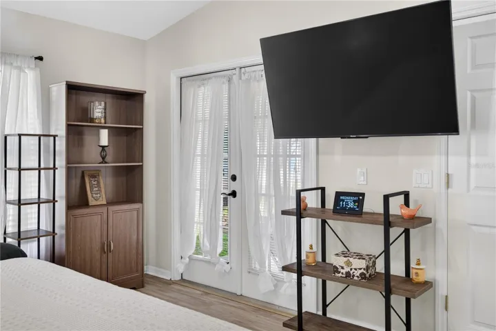 Primary Bedroom with French door access to the backyard