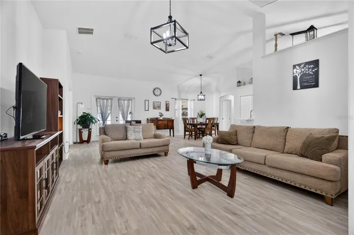 Living area with the view of dining and French door