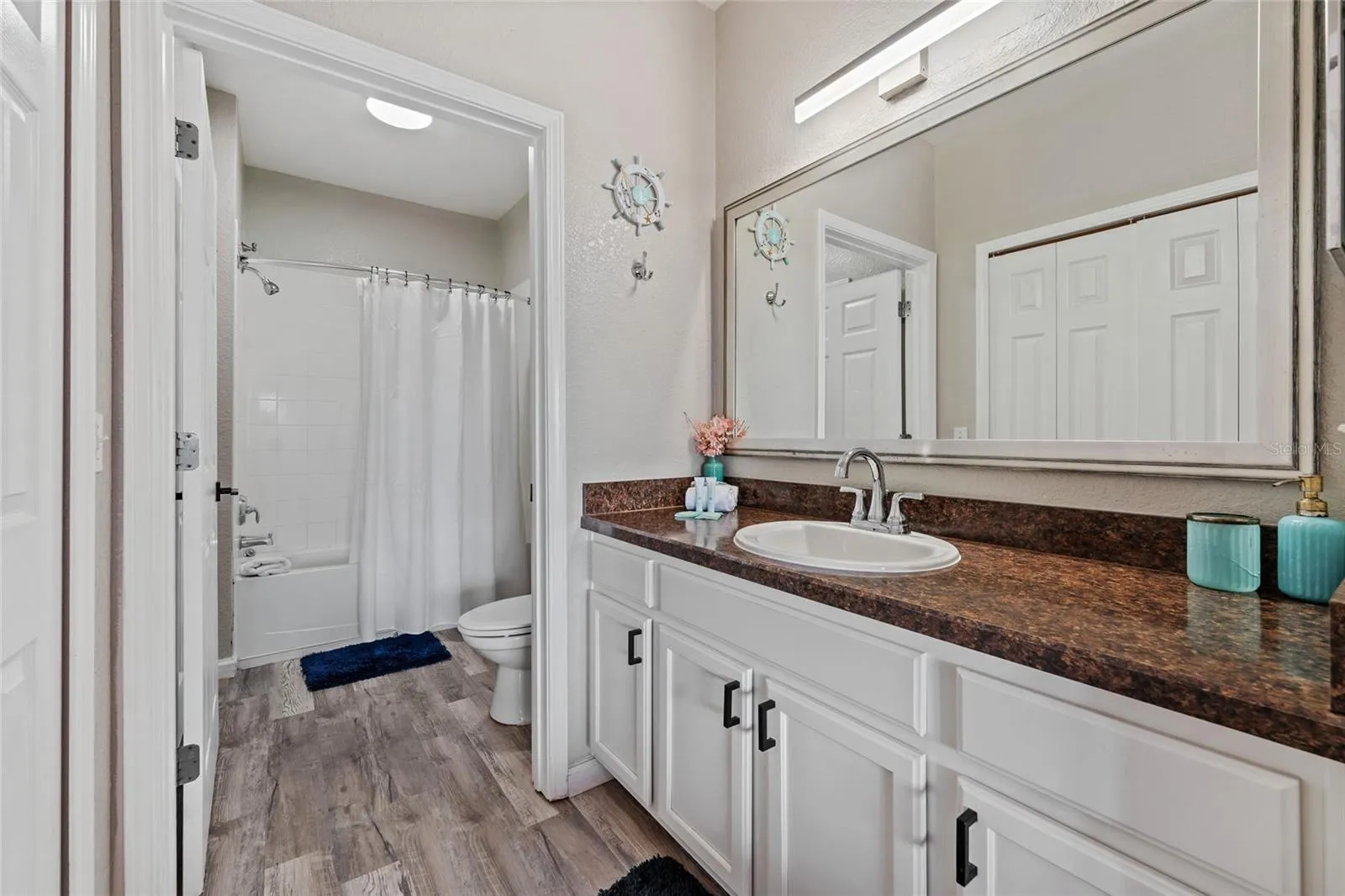 Second bedroom bathroom, also accessible from hallway door