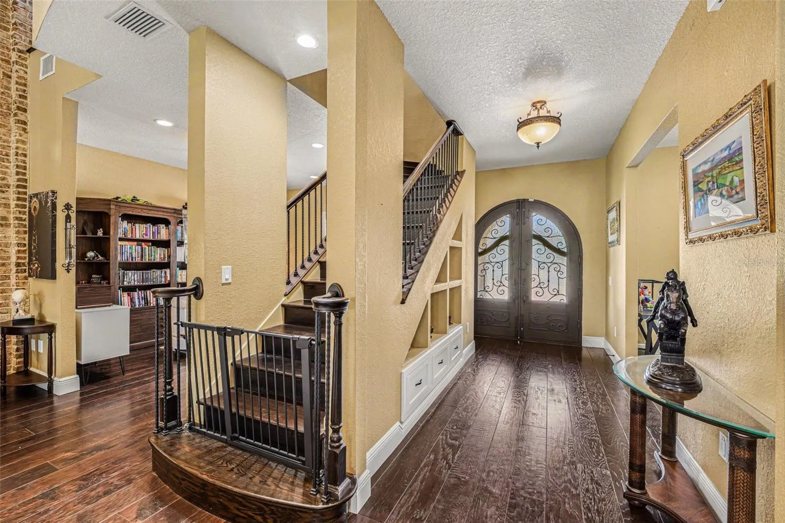 facing front entrance inside, stairway to loft