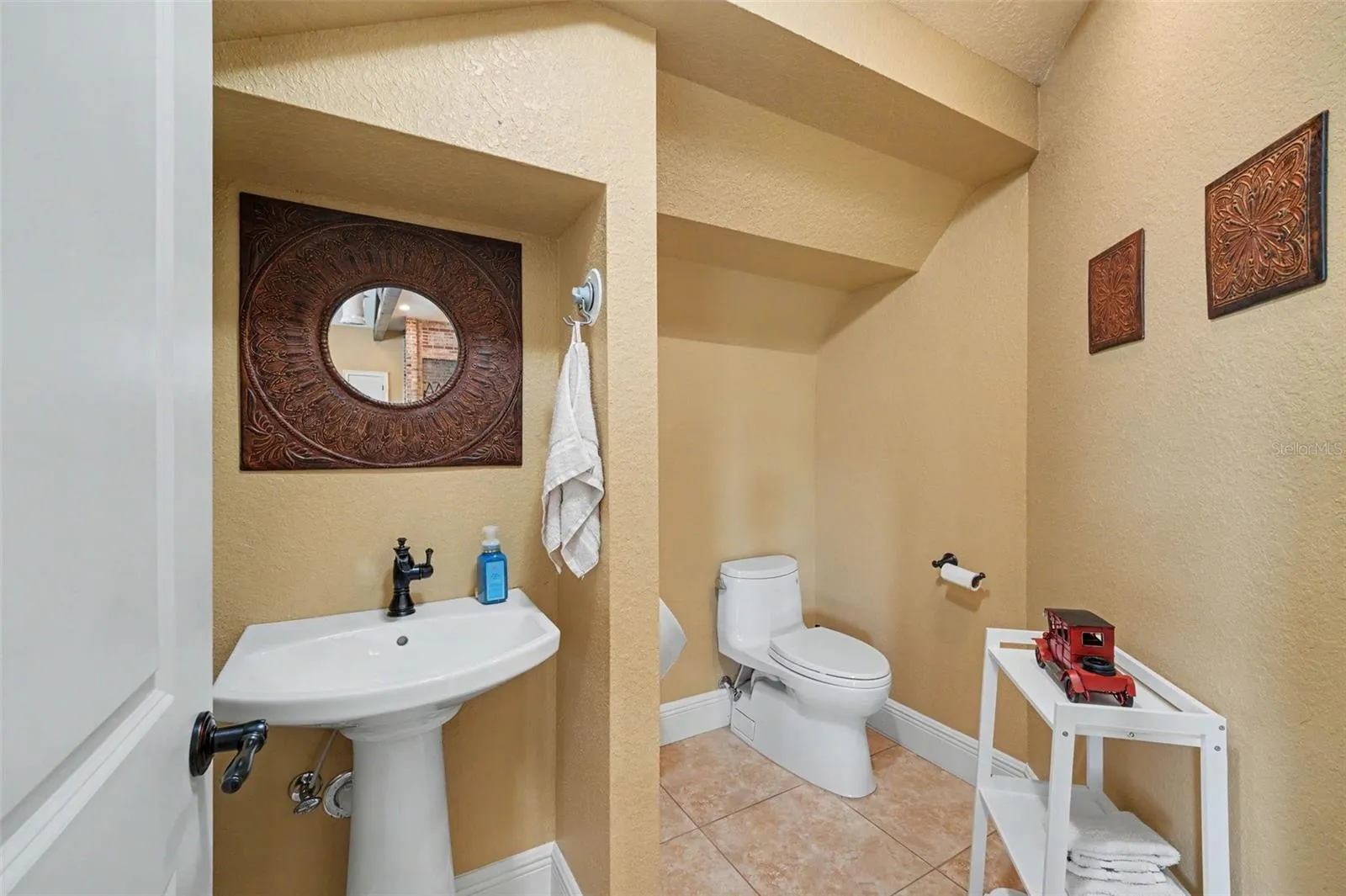 loft half bath with urinal