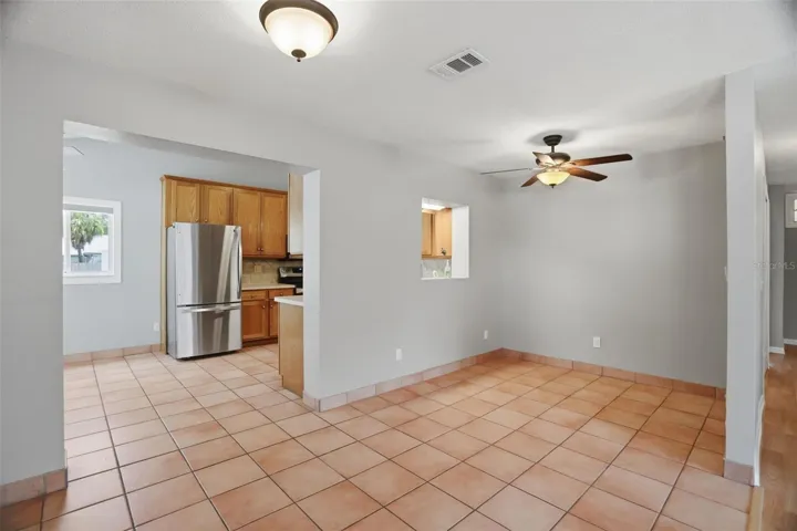 Flex space for dining, bar, office off of entry and between the kitchen and living room