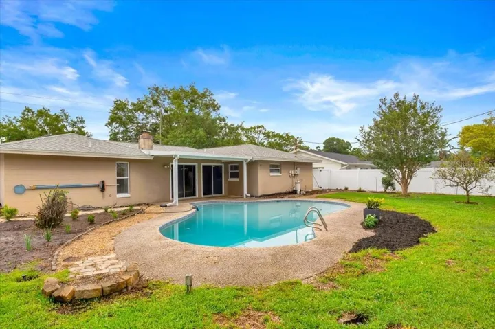 Pool area to back of house.