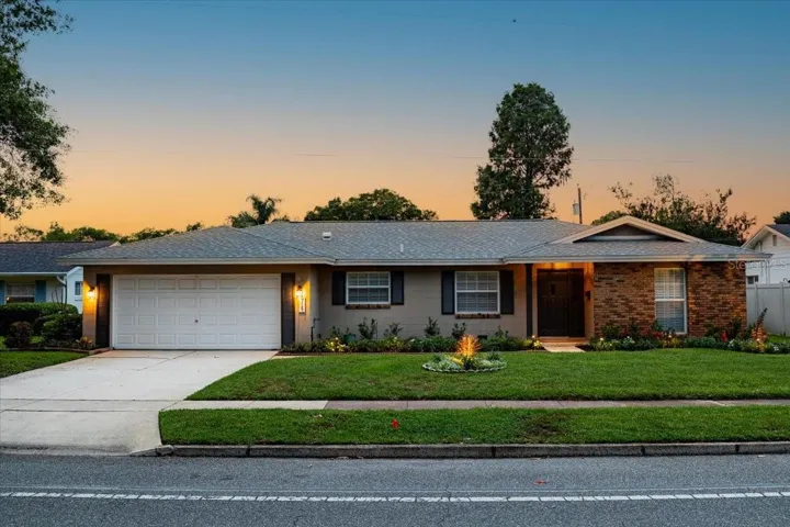 Front of home at twilight.