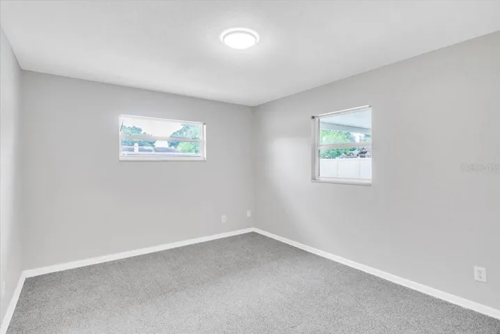 Bedroom #4 with new carpeting and paint.