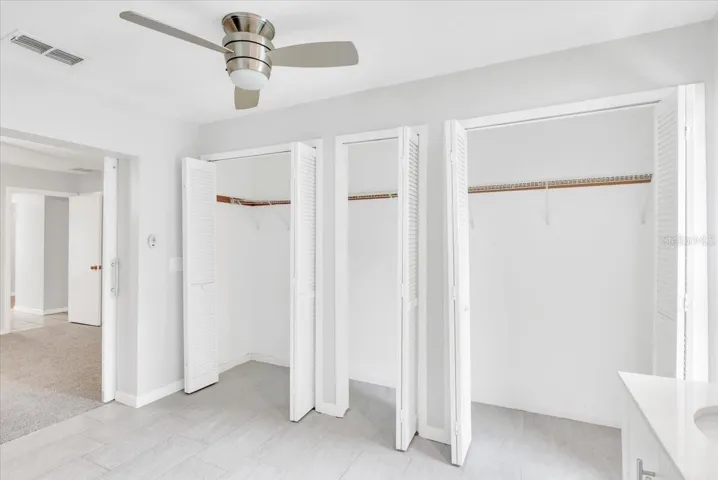Primary bathroom storage closets.