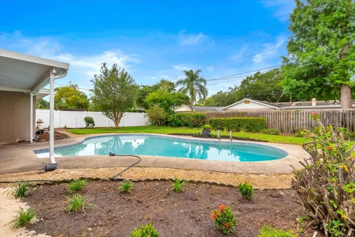 Side pool area to backyard.