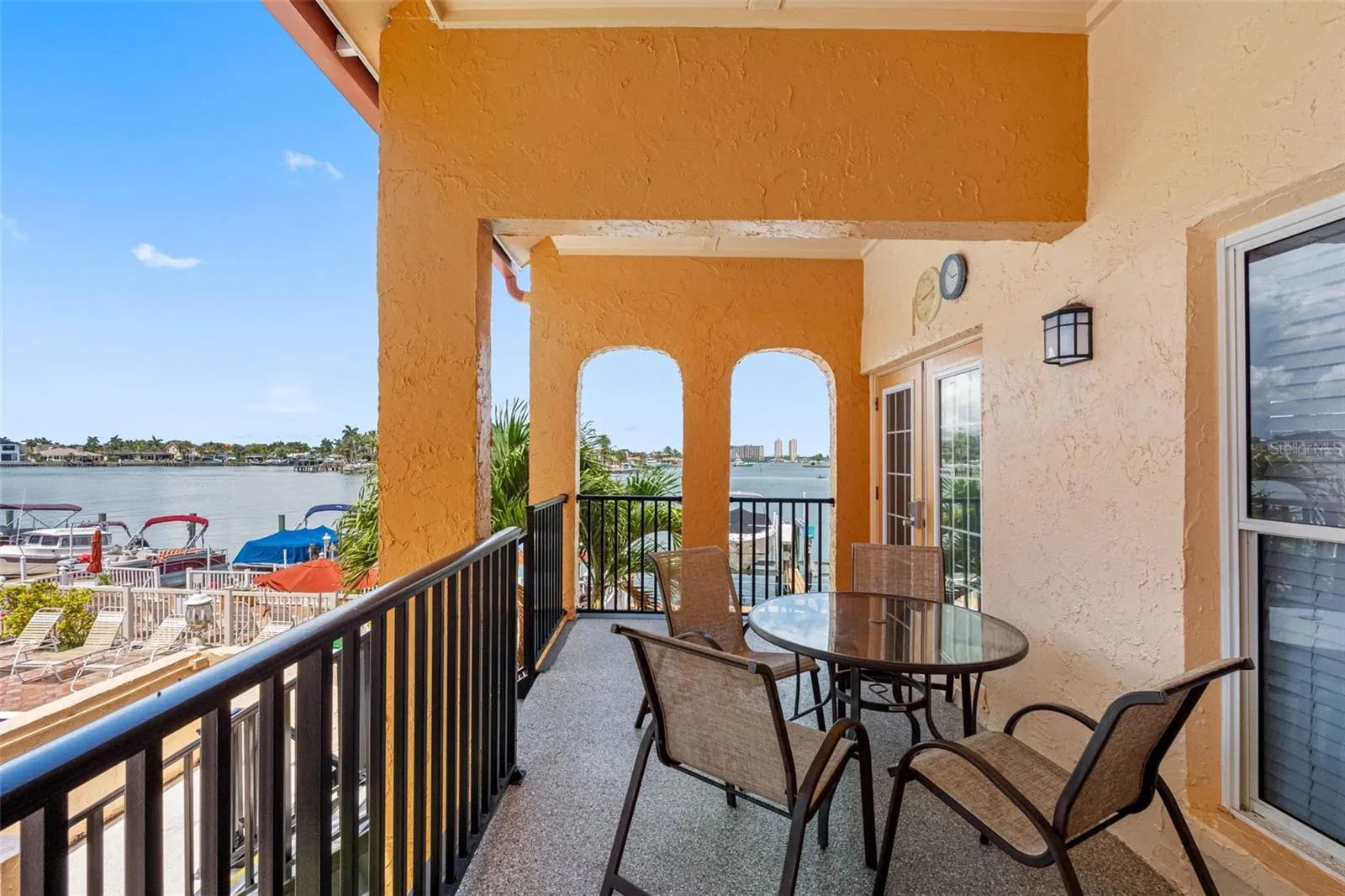 Balcony outside clubhouse is a lovely place to play cards, have drinks and conversations