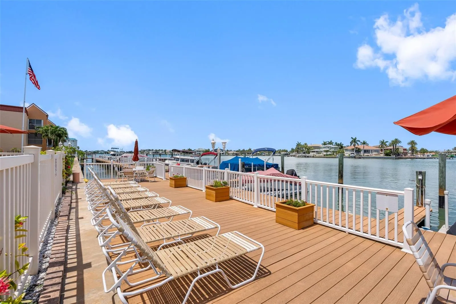 Sun deck directly behind the pool