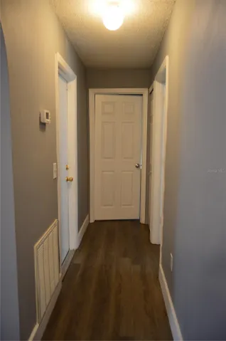 hallway to bedroom 1 and 2