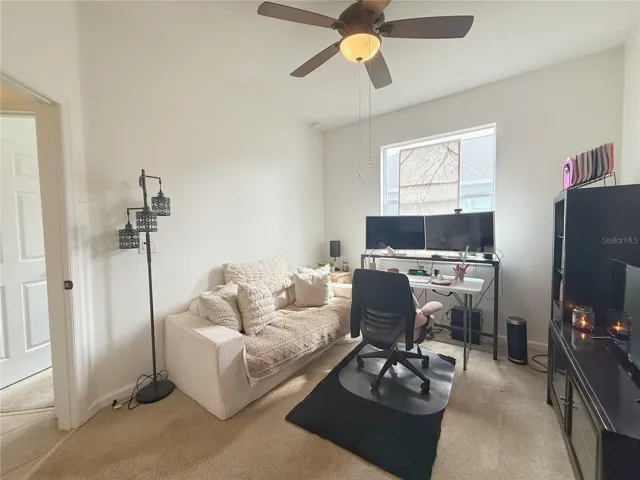 Additional view of bedroom two with bedroom three in the background