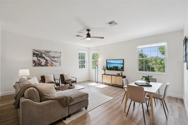 Expansive loft area with abundant natural light and an open layout perfect for relaxing, working, or entertaining. A flexible bonus space to fit a variety of lifestyles.