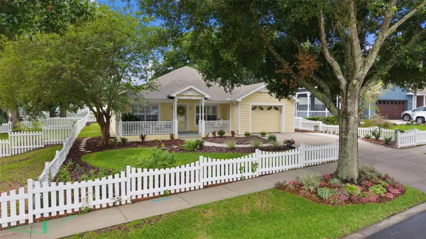 PICKET FENCES AND FRONT PORCHES IS THE CONSTANT IN THIS NEIGHBORHOOD
