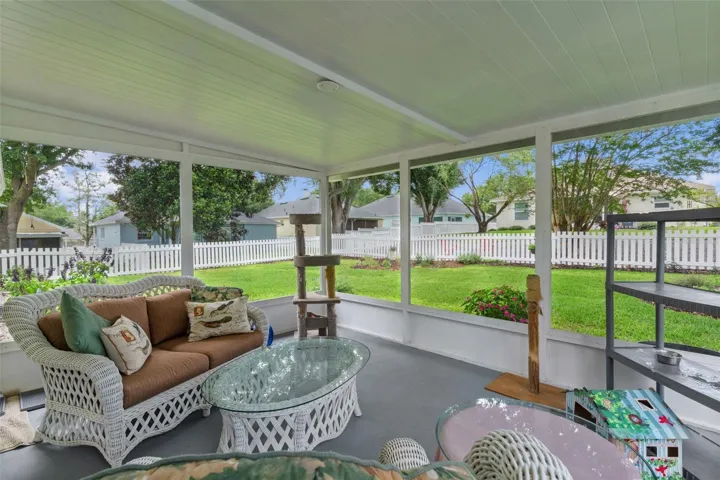 SCREENED BACK PORCH, PAINTED FLOOR, VIEW OF LANDSCAPED BACKYARD