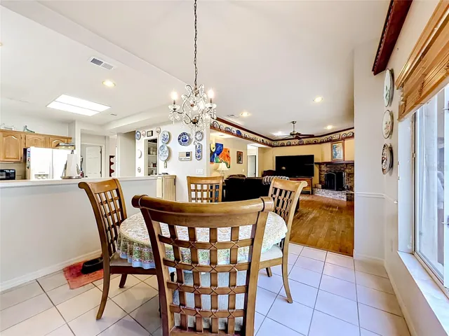 Open flow between kitchen, dining, and living spaces