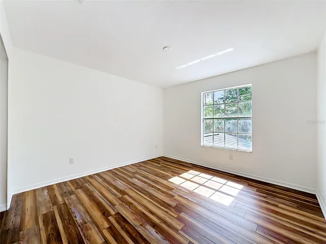 Generously sized secondary bedroom with abundant natural light