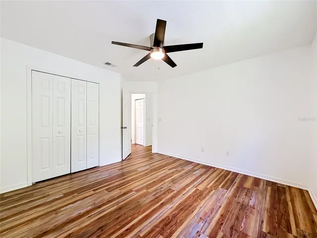 Spacious bedroom 3 with large closet and natural light