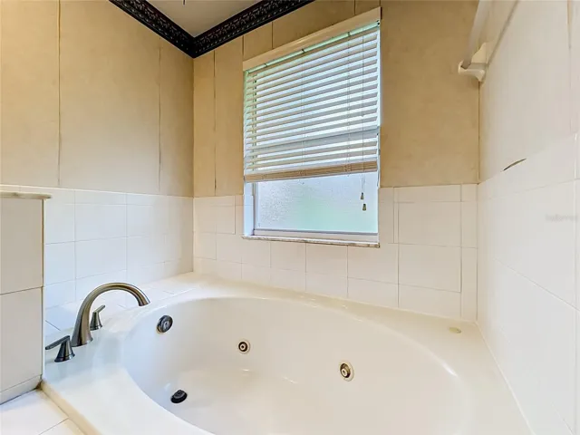 Relaxing garden tub creates a spa-like retreat in the primary bath