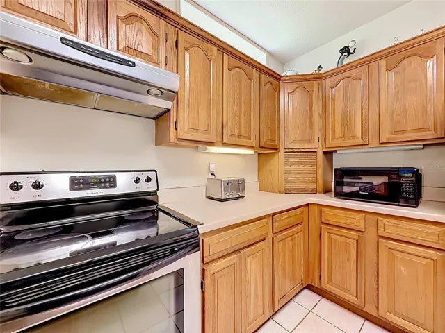 Functional workspace with abundant cabinetry and countertop space