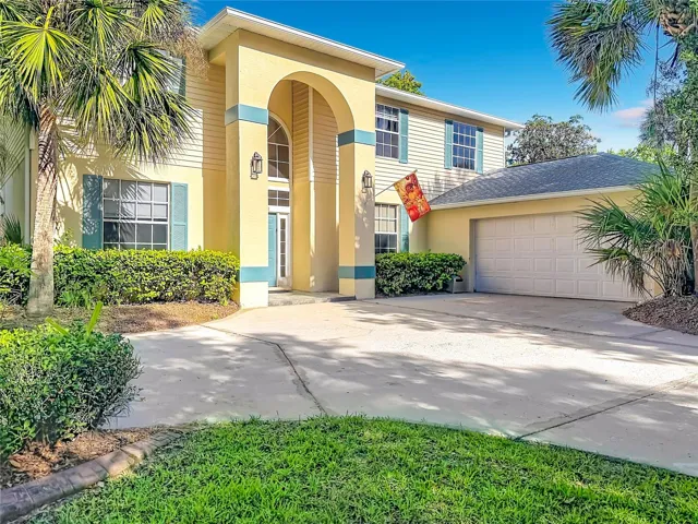 Grand entry and side-entry garage on a private 2.1-acre homesite