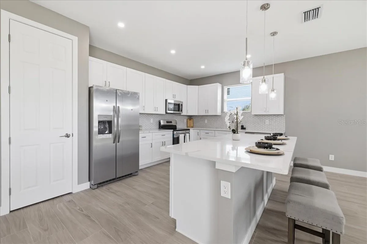 stainless appliances + island