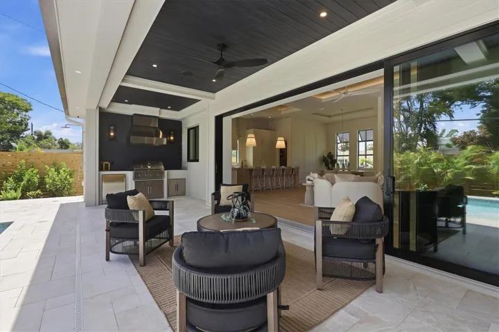 Lanai with outdoor kitchen, pocketing sliders
