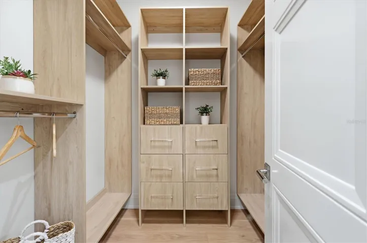 Primary Closet with custom cabinetry