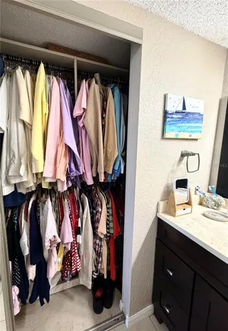 2 of 2 Master Bedroom closets with Built In Organizers and Storage