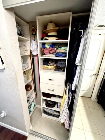 2 of 2 Master Bedroom closets with Built In Organizers and Storage