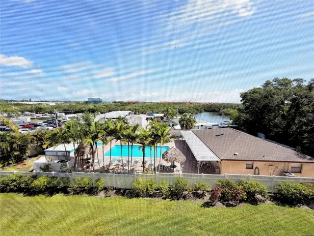 View from Balcony to the pool, marina, and Bay