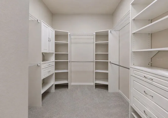 Primary Suite Walk in closet.