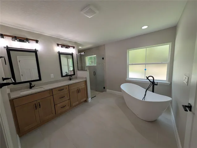 Photos are of a model home. Colors, cabinetry, and fixtures will vary, offering a unique finish for this specific build.