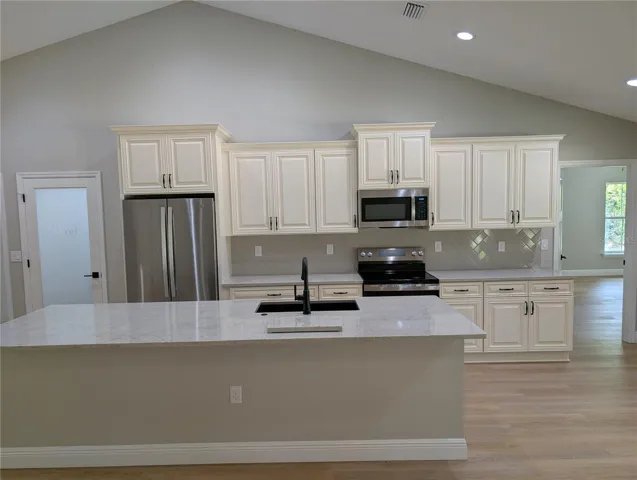 Photos are of a model home. Colors, cabinetry, and fixtures will vary, offering a unique finish for this specific build.
