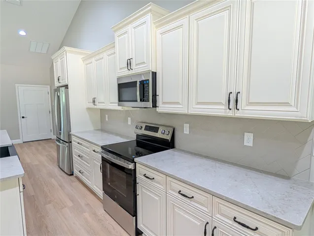 Photos are of a model home. Colors, cabinetry, and fixtures will vary, offering a unique finish for this specific build.