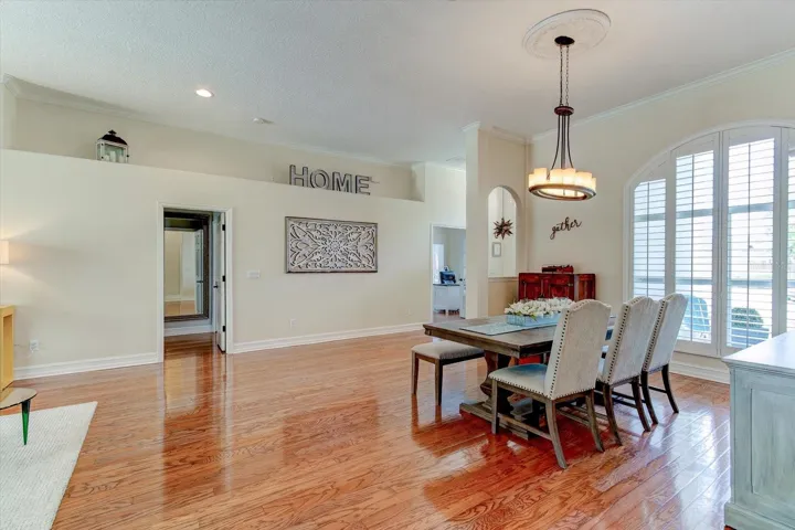 Welcoming formal spaces with 11 feet high ceilings to greet your guests with grandeur