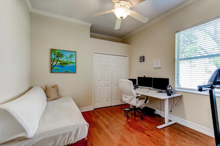 Bedroom with wooden flooring