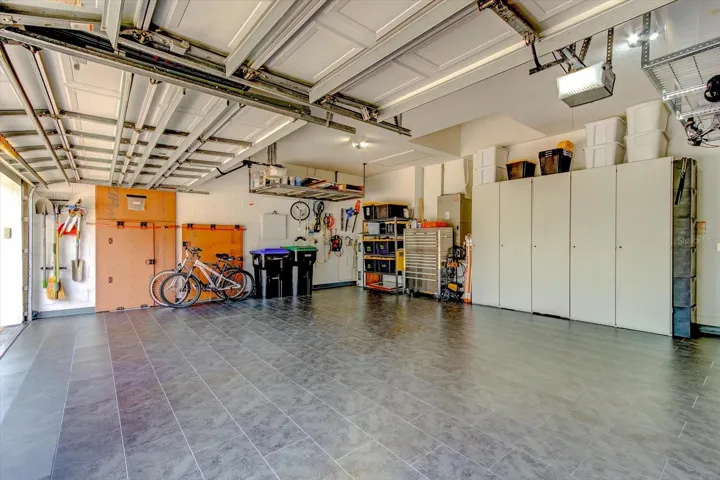 Extended garage with stone-composite flooring