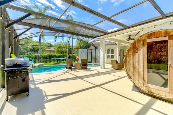 The screened outdoor area is massive and even houses a sauna