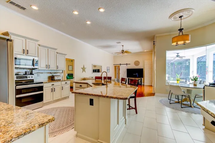 Enter into the kitchen and family space with all new tile flooring
