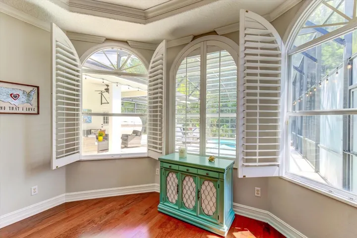 Plenty of light with beautiful plantation shutters in the primary bedroom