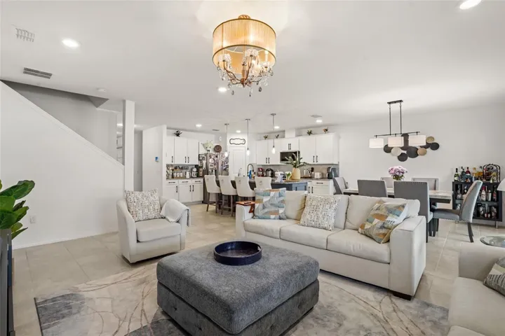 Living room open to kitchen and dining