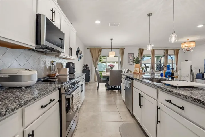 Kitchen open to dining room and living room