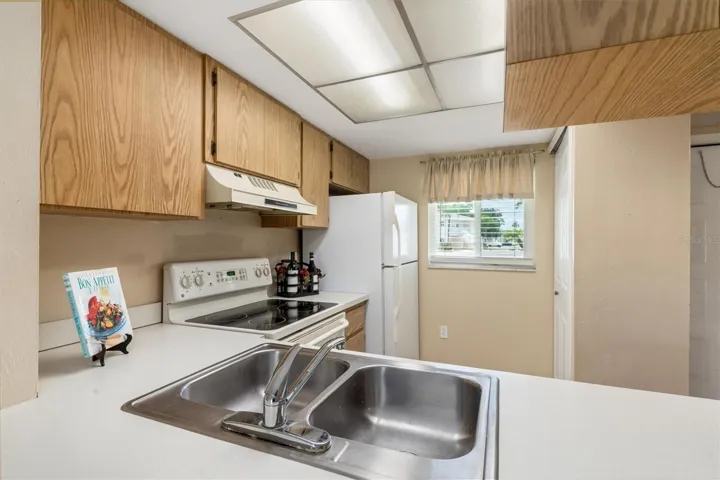Kitchen has closet pantry