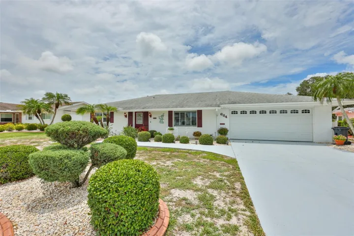 Front, Painted Drive & Walk Way, Upgraded Concrete Curbing, Charming Curb Appeal