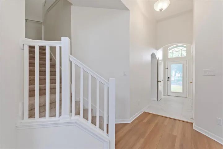 Stairs leading to two bedrooms and one full bathroom