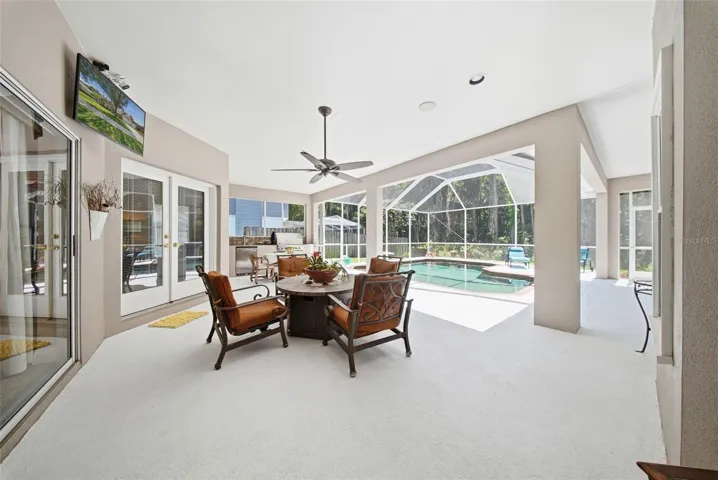 Large entertainment area with salt water pool, outdoor grill and a kegerator!