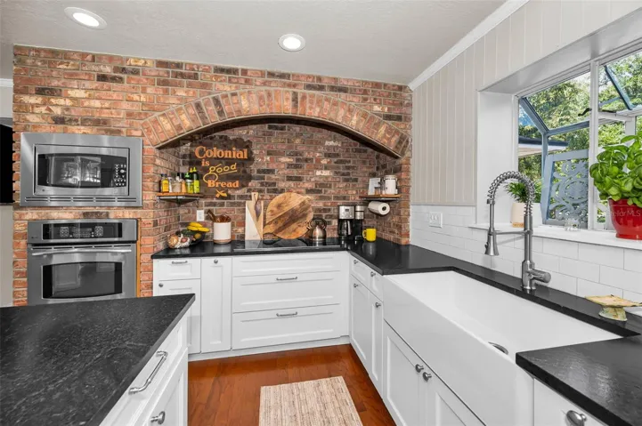 Farmhouse sink, greenhouse window, Chicago Brick, Granite